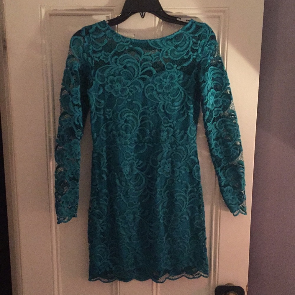 Aqua colored lace mini dress.  Size 6.
